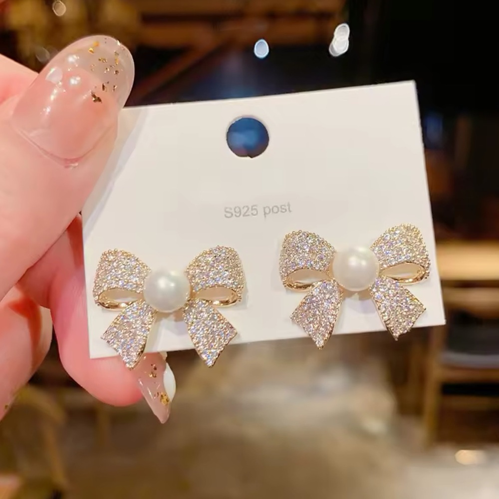 Elegant Gold Bow Pearl Earrings